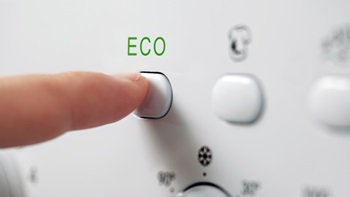 close-up van eco-programma knop op wasmachine